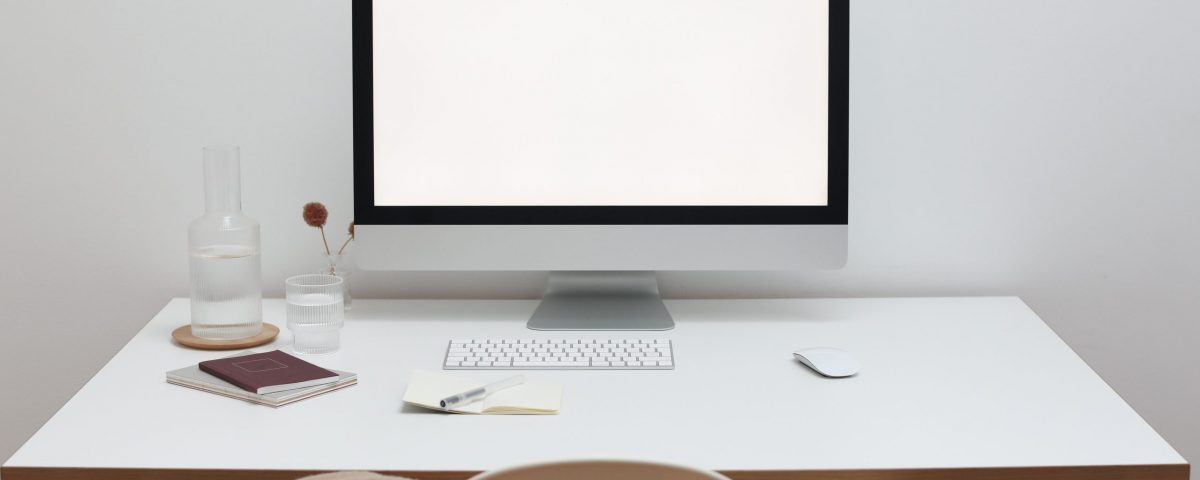 Free Stylish workspace with computer and simple furniture Stock Photo